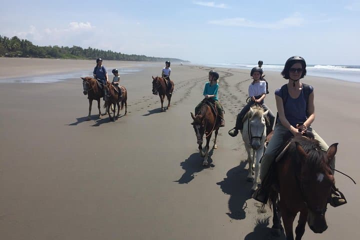 Horseback riding through the beaches of Esterillos near Jaco