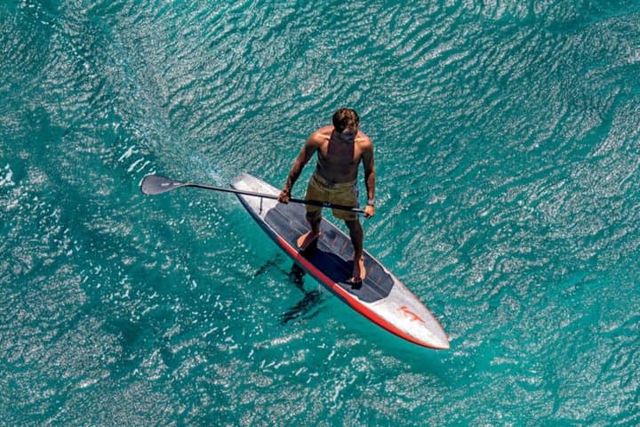 Surf Foil Lesson in Tamarind Fly over the water